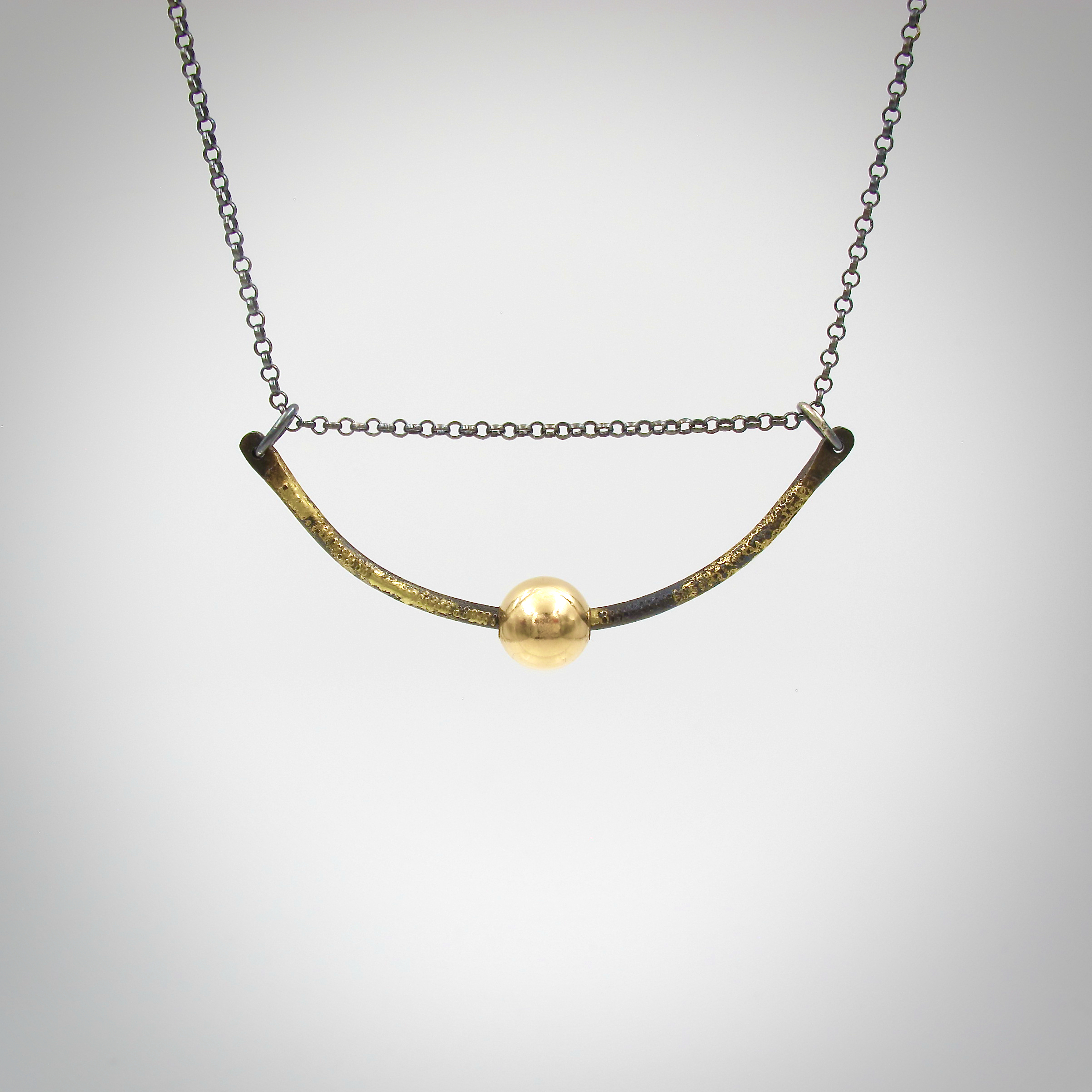 Steel and gold necklace