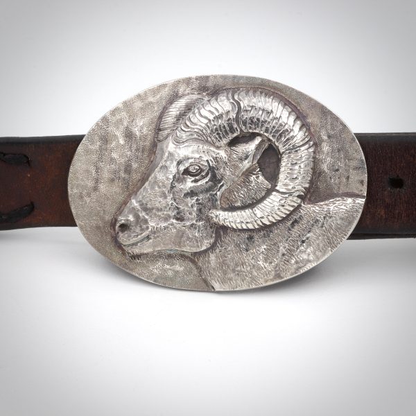 sterling silver chased and repoussed belt buckle