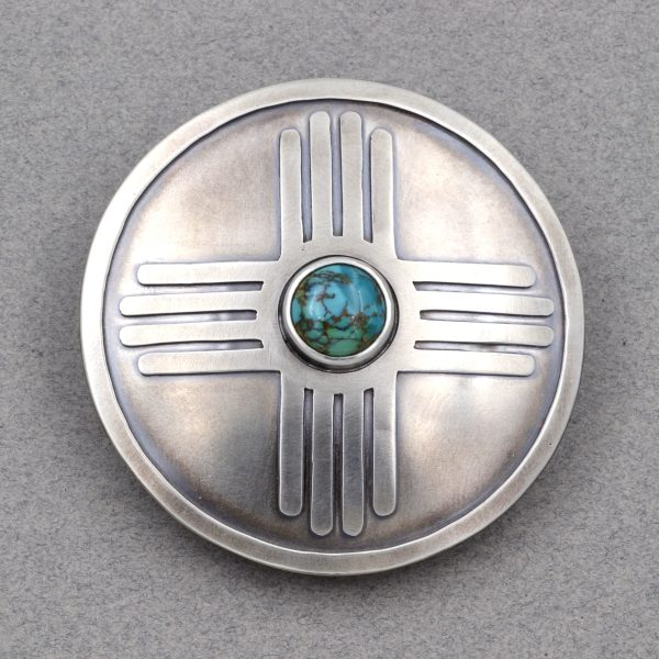 silver zia belt buckle with turquoise